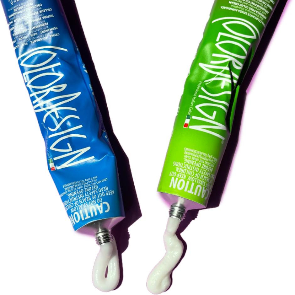 A green and blue tube of ColorDesign with product coming out of both products